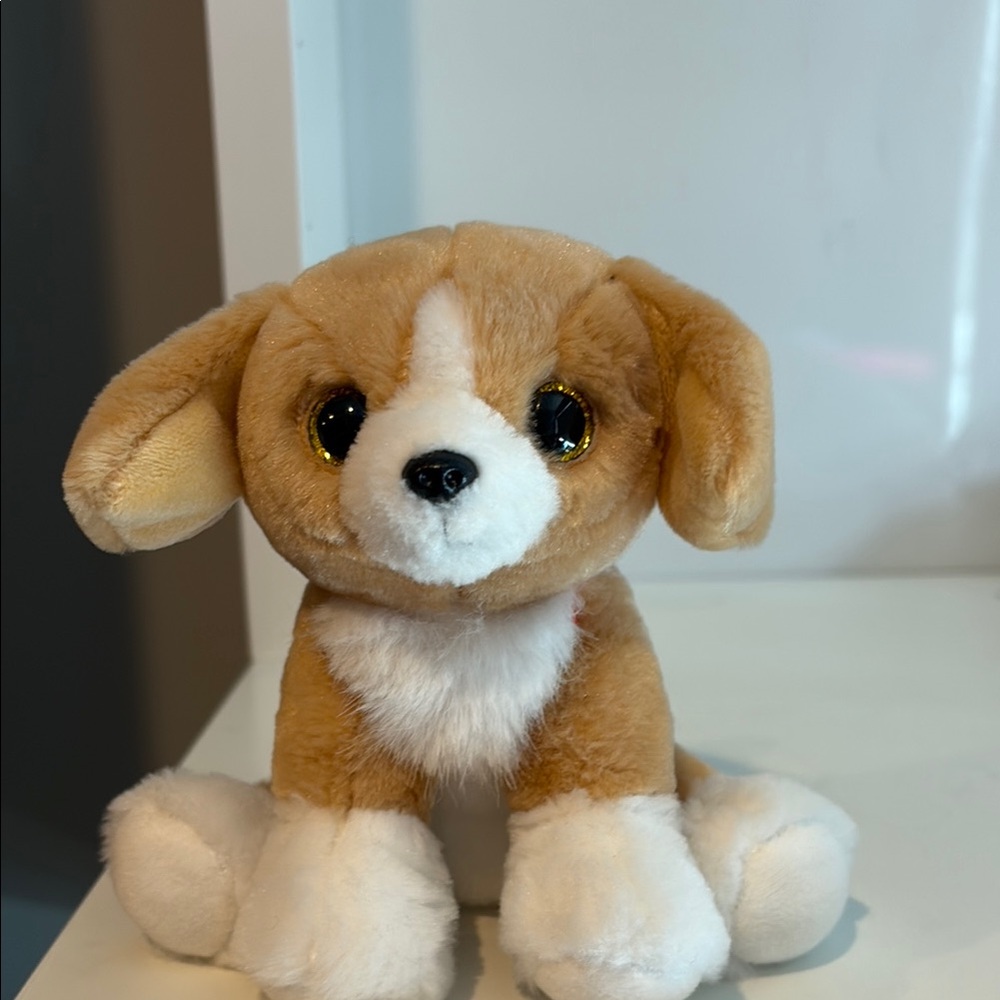 Adorable Tan and White Plush Puppy